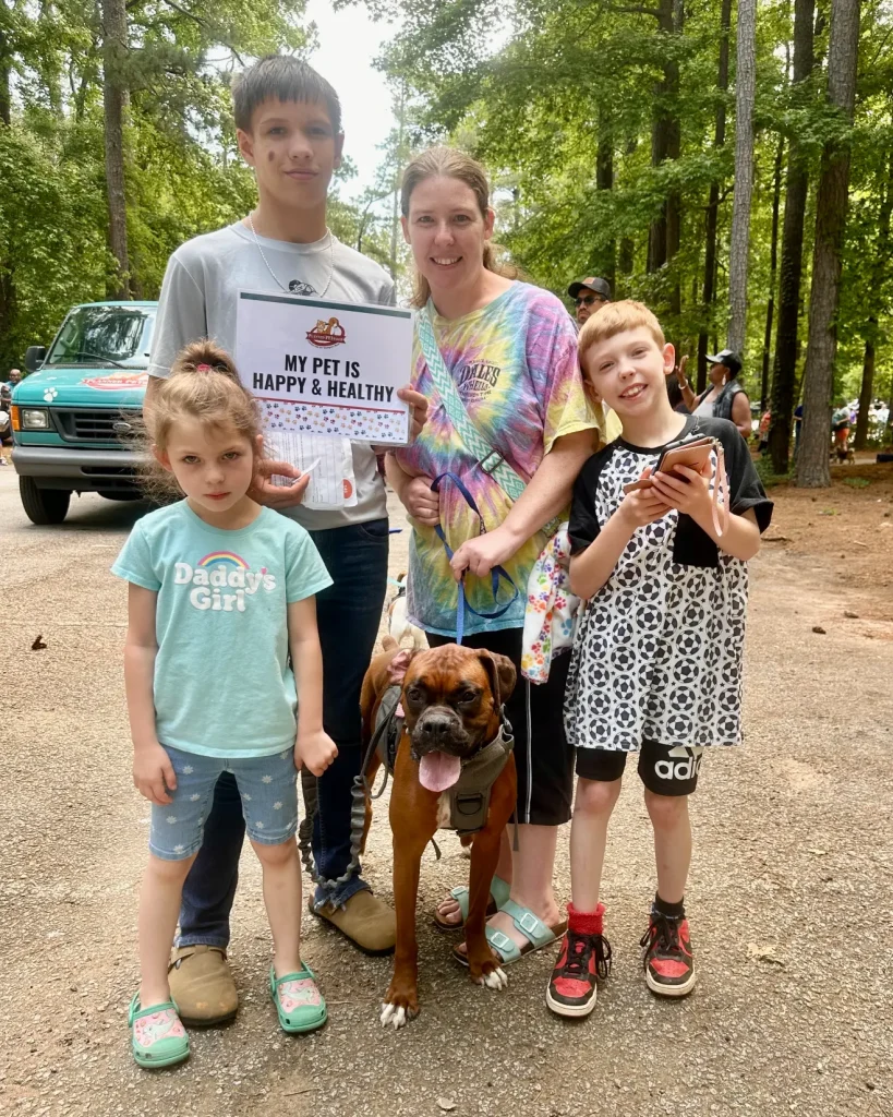 Compassion in Action: Over 200 Pets Served at Newton County Outreach Event 1 A boxer who came with her dog mom and her three children.